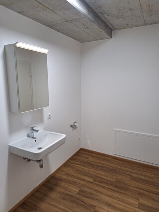 1 Zimmer Neubau-Wohnung mit Carport